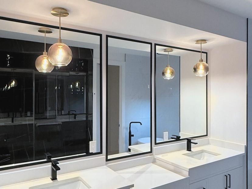 White double vanity with cabinet storage.